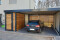 Doppel-Carport aus Stahl mit Anbau-Geräteraum seitlich - BRANDL